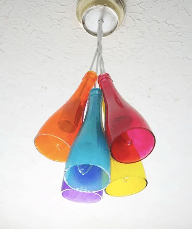 Colorful bottles used to make a chandelier