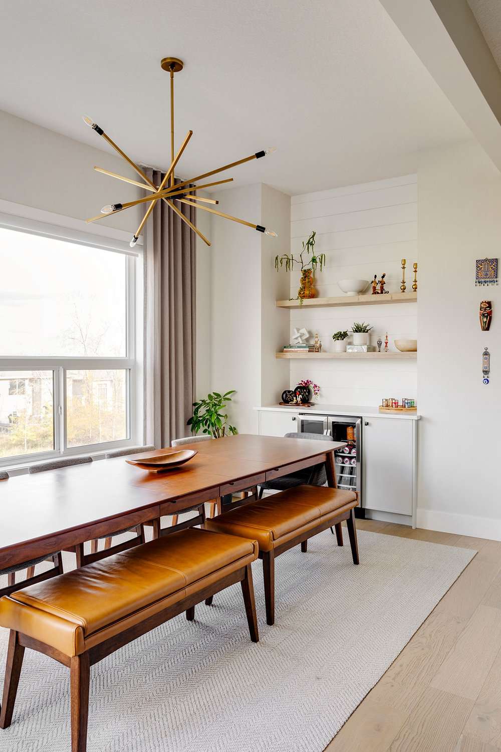 dining room with fixed curtain panels flanking window