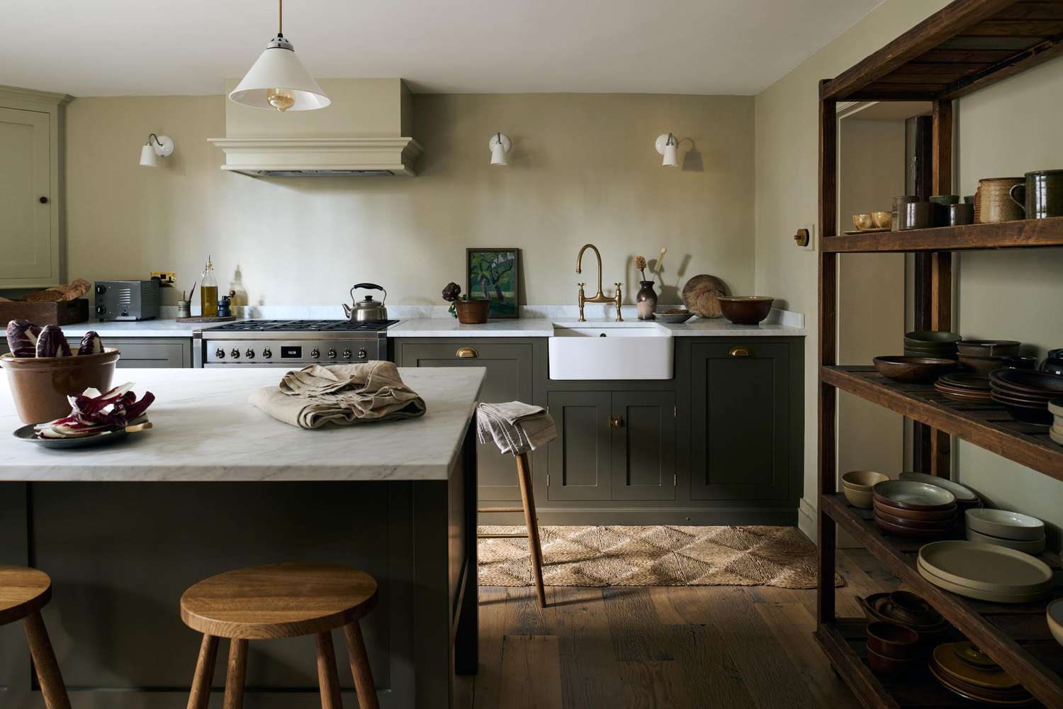 earthy green kitchen cabinets with light green walls