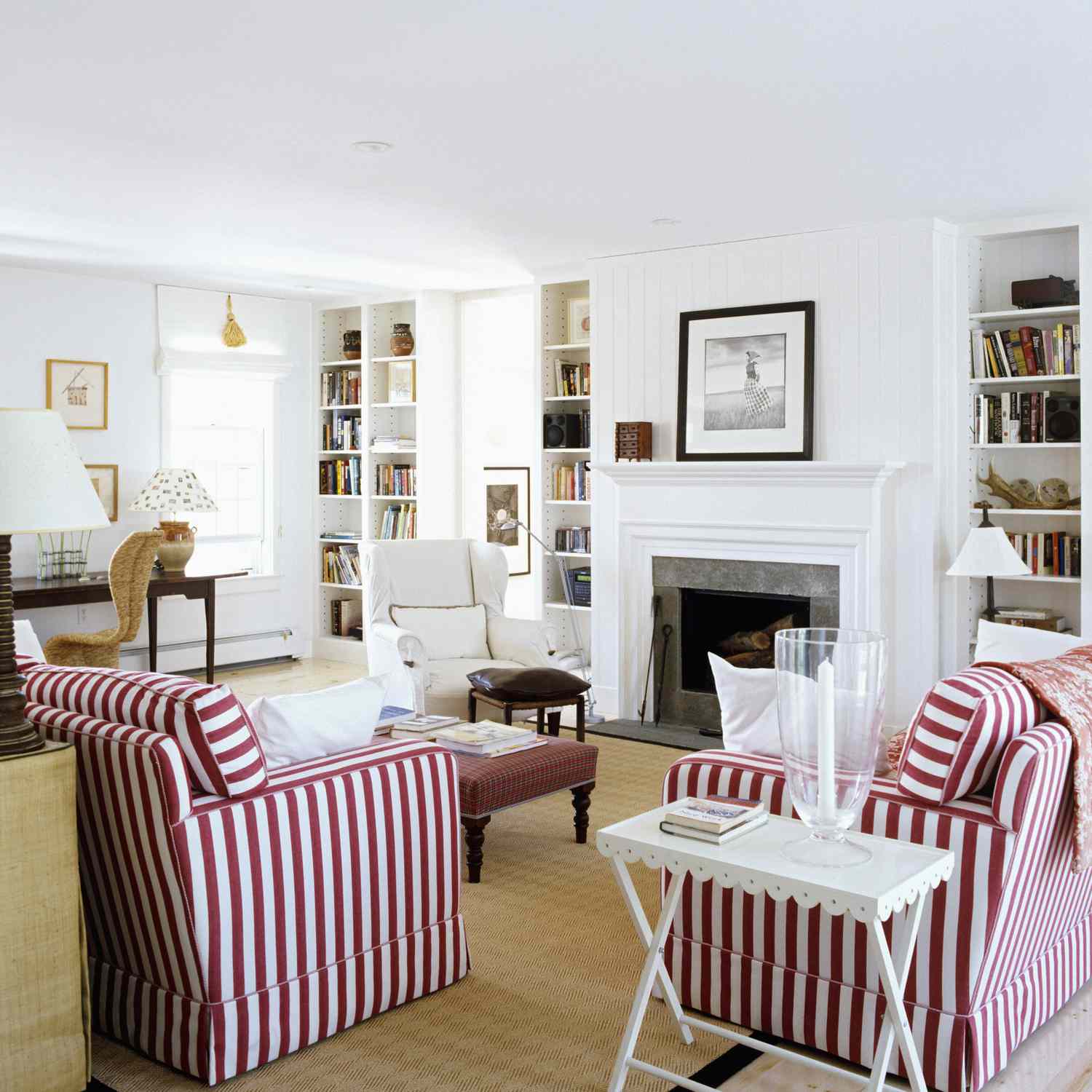 Red and white striped couch and chairs in living room