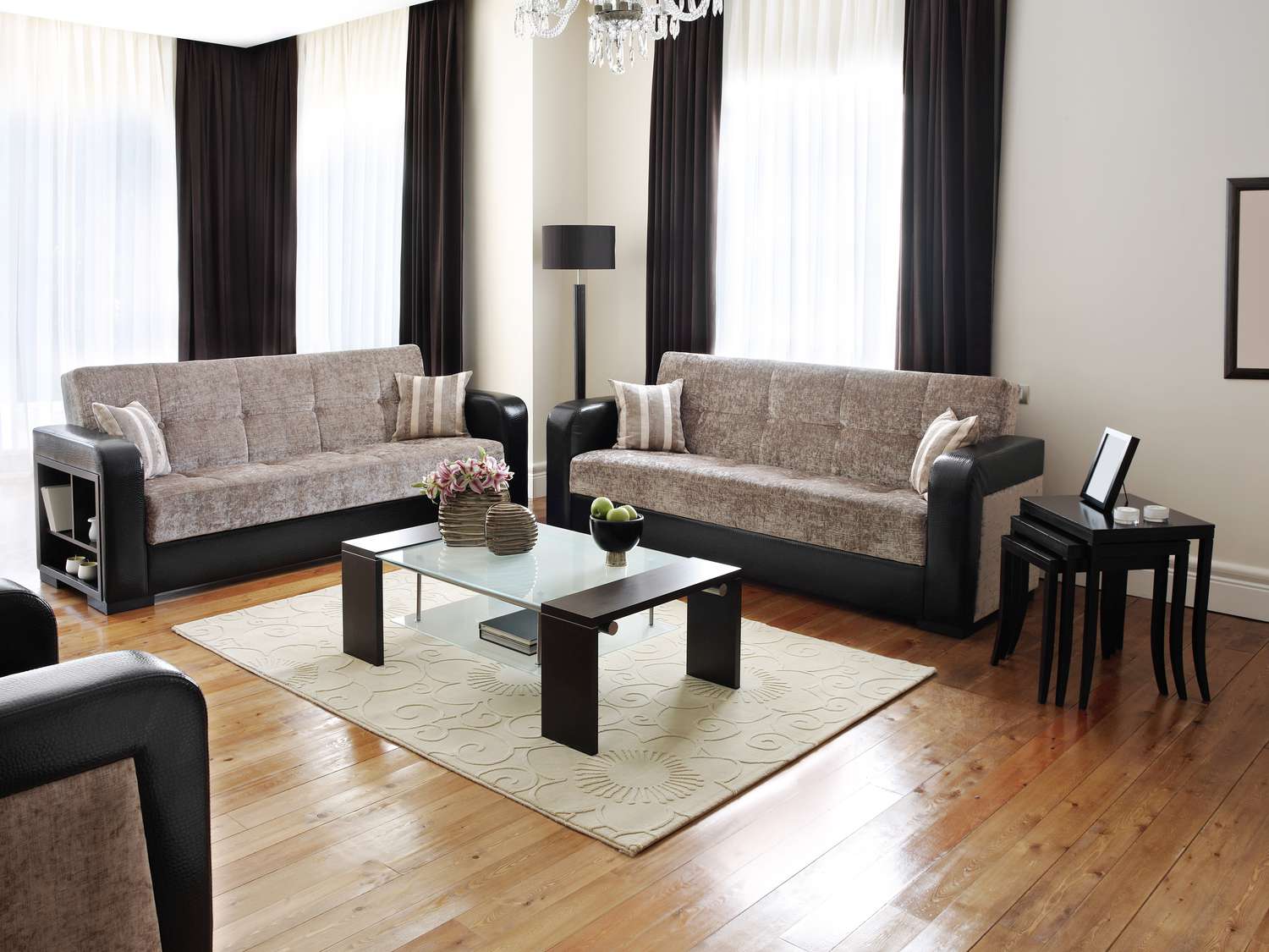 Black and gray sofas and matching chair