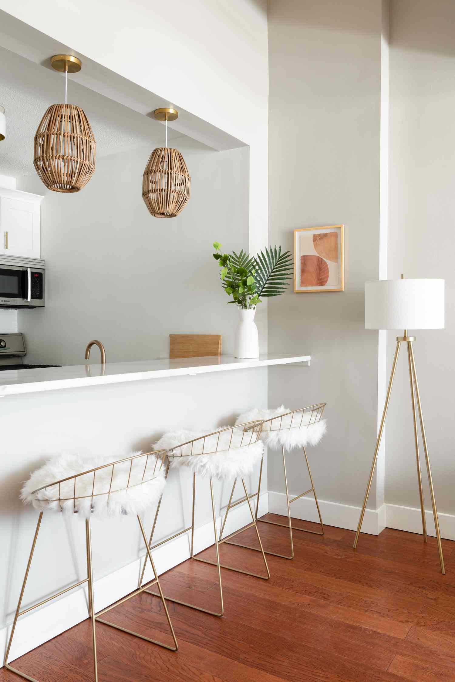 small apartment kitchen bar with pendant lights