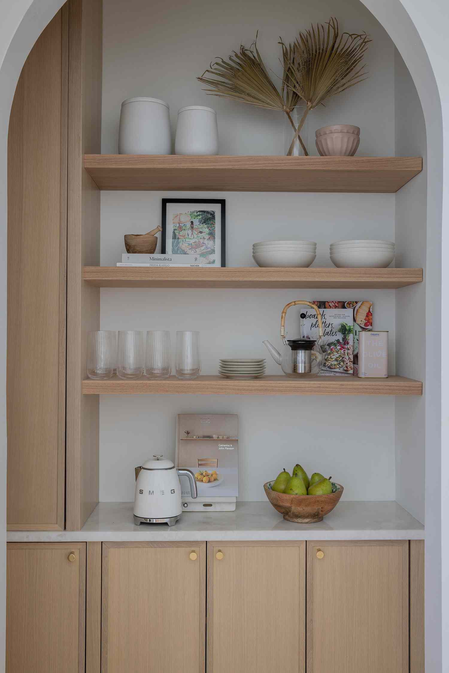 small arched open kitchen pantry