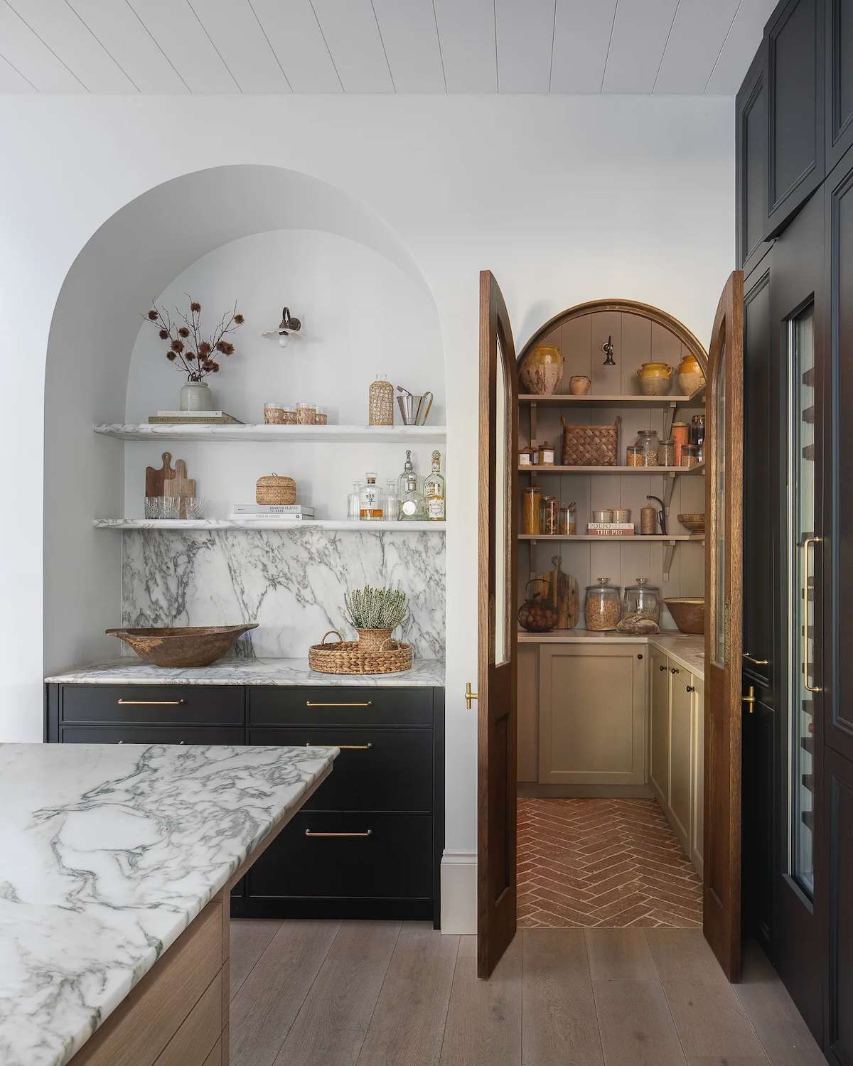 kitchen pantry with arched opening 