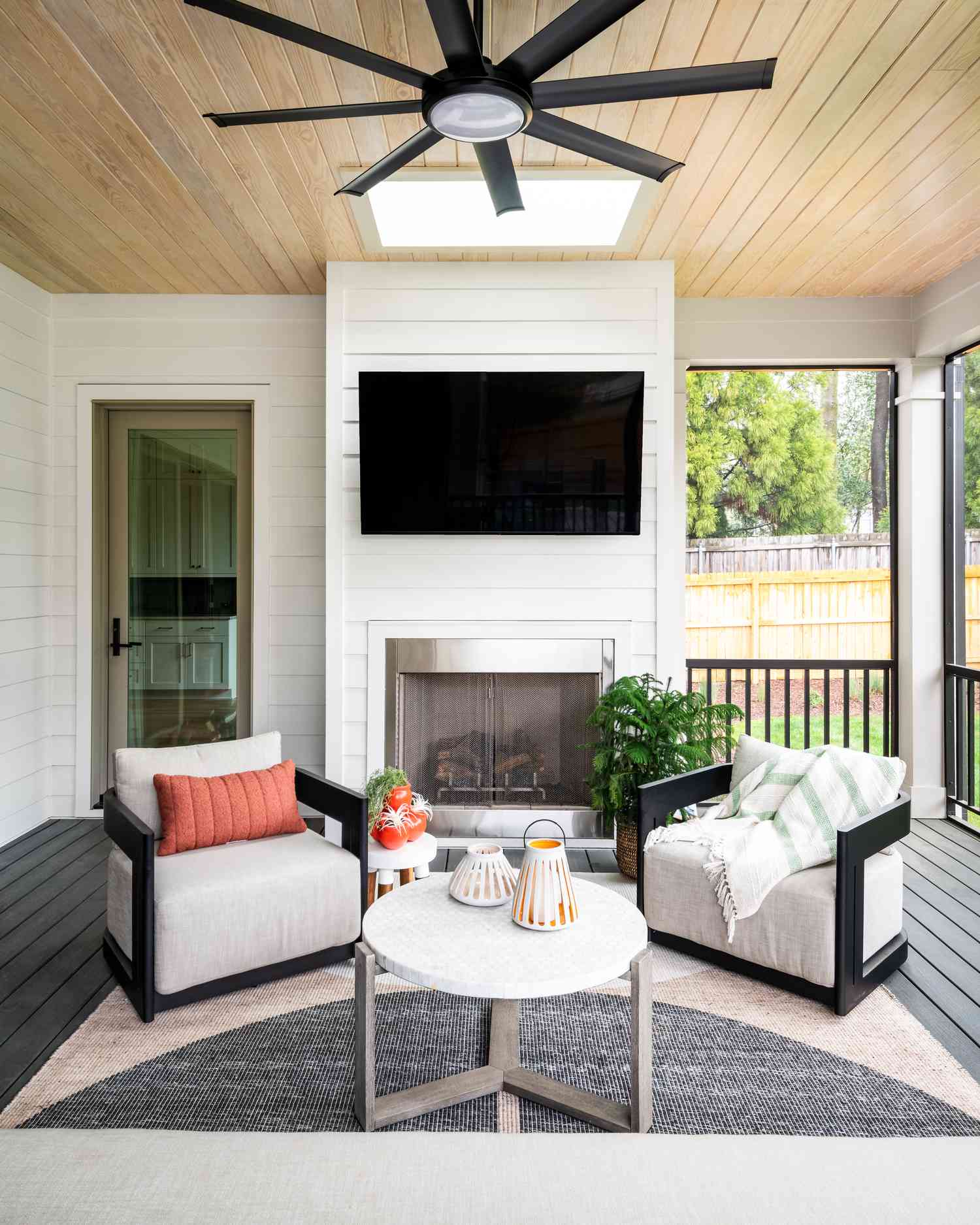 outdoor space with TV and living room furniture