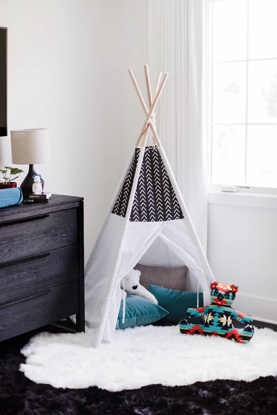 black-and-white play tent in child's room