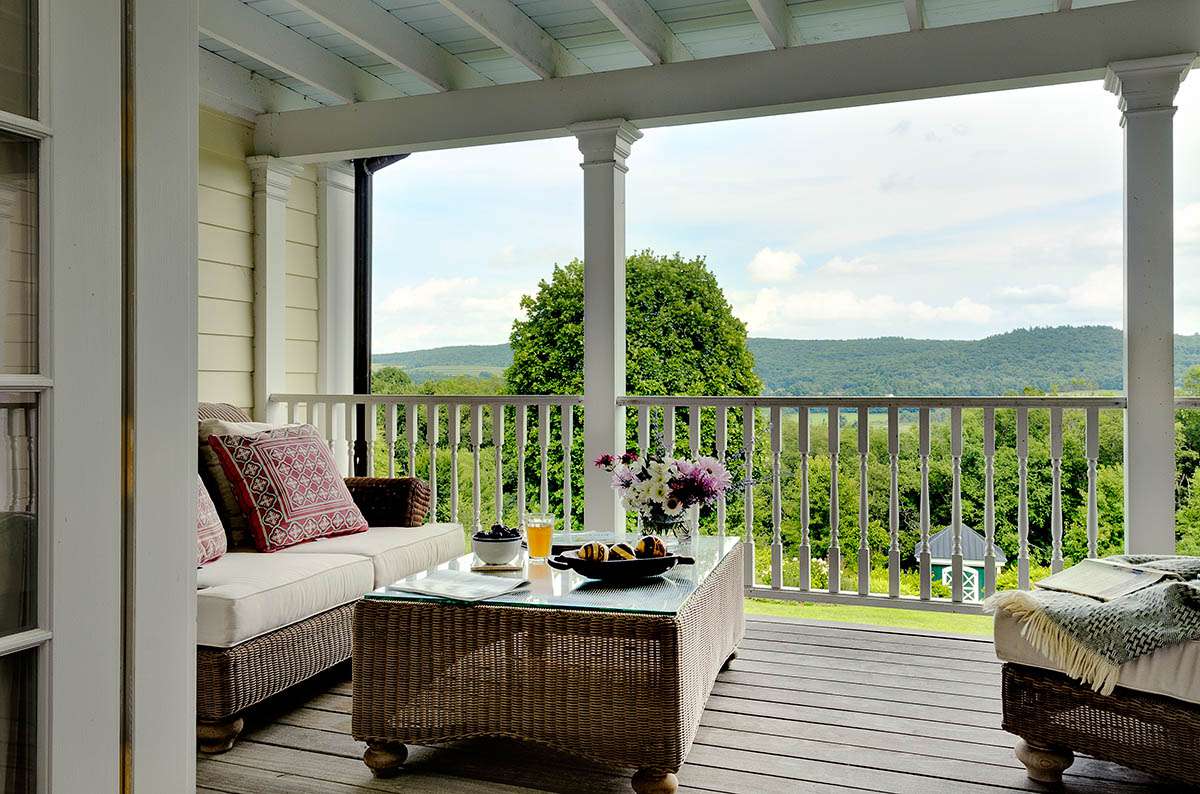 open porch with haint blue painted ceilings