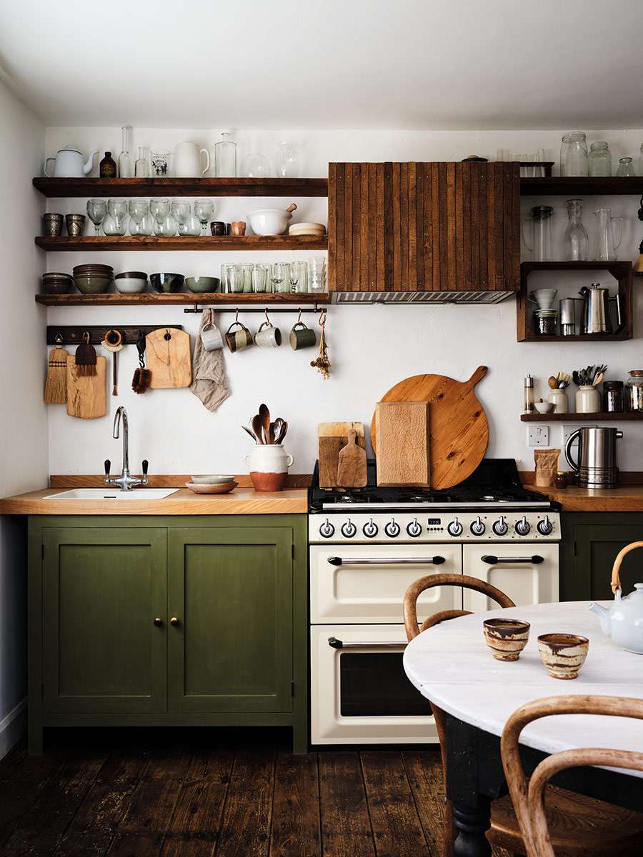 olive green kitchen cabinets in country kitchen