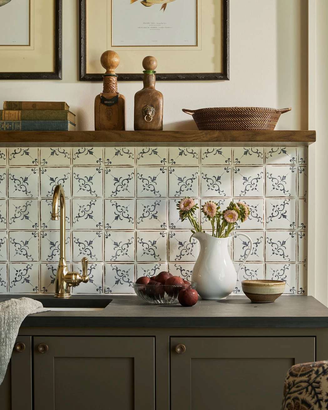 olive green kitchen cabinets with vintage tile backsplash