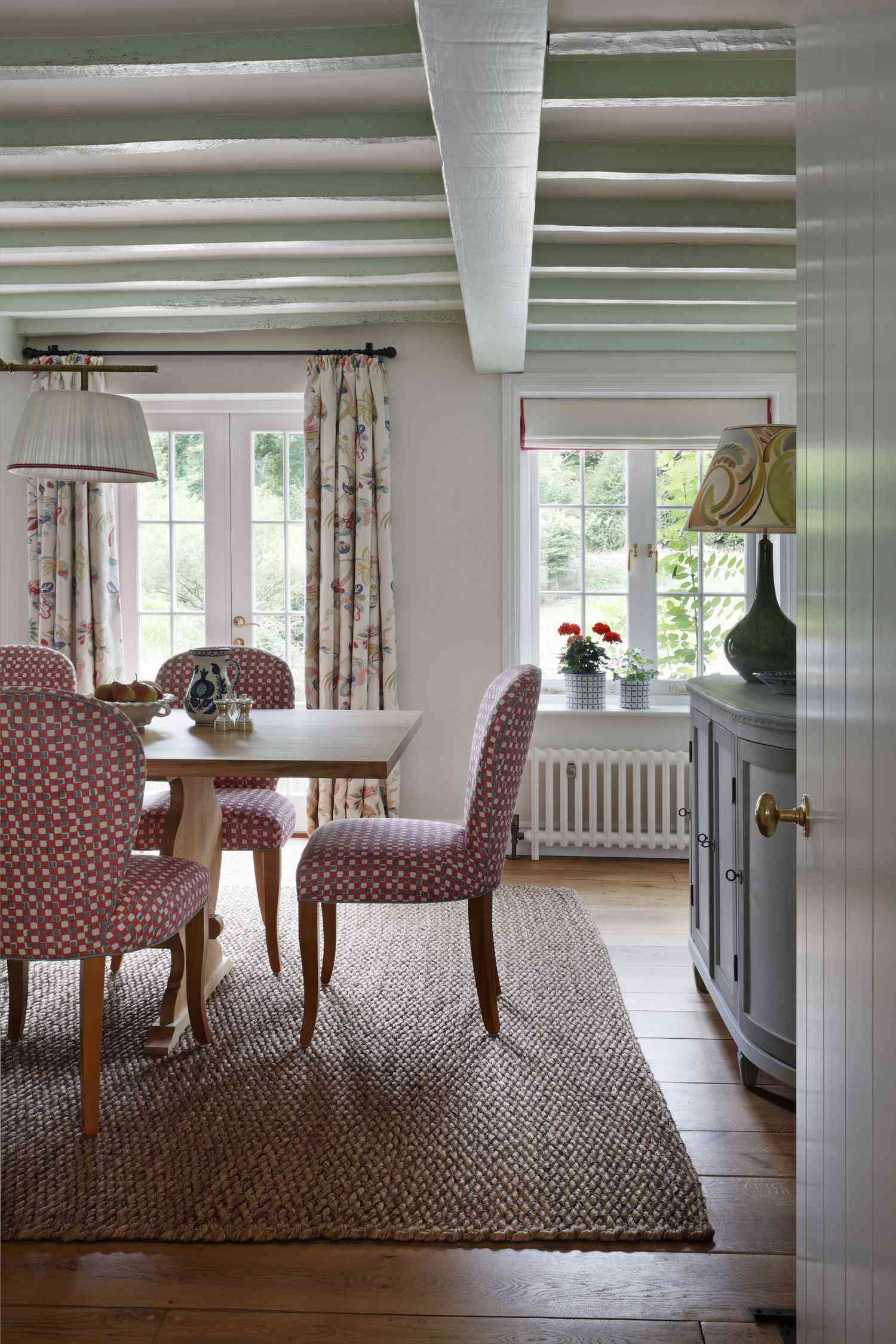 patterned colorful curtains in traditional dining room