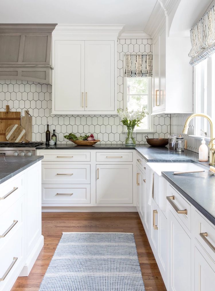 white shaker kitchcen cabinets with geometric backsplash