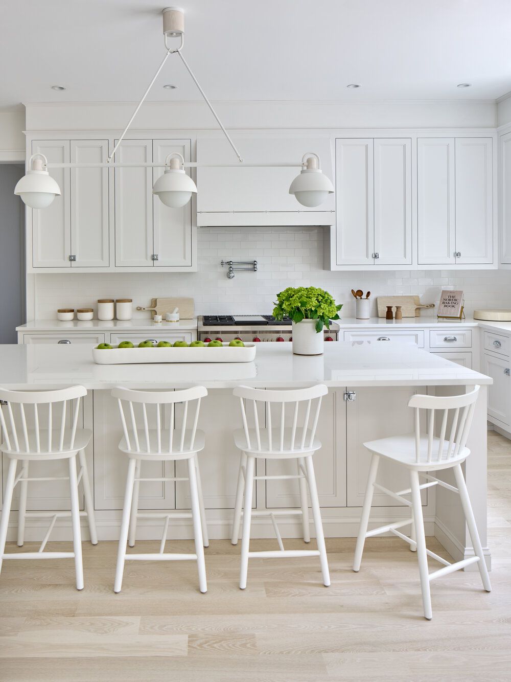 white kitchen subway tile backsplash with white cabinets