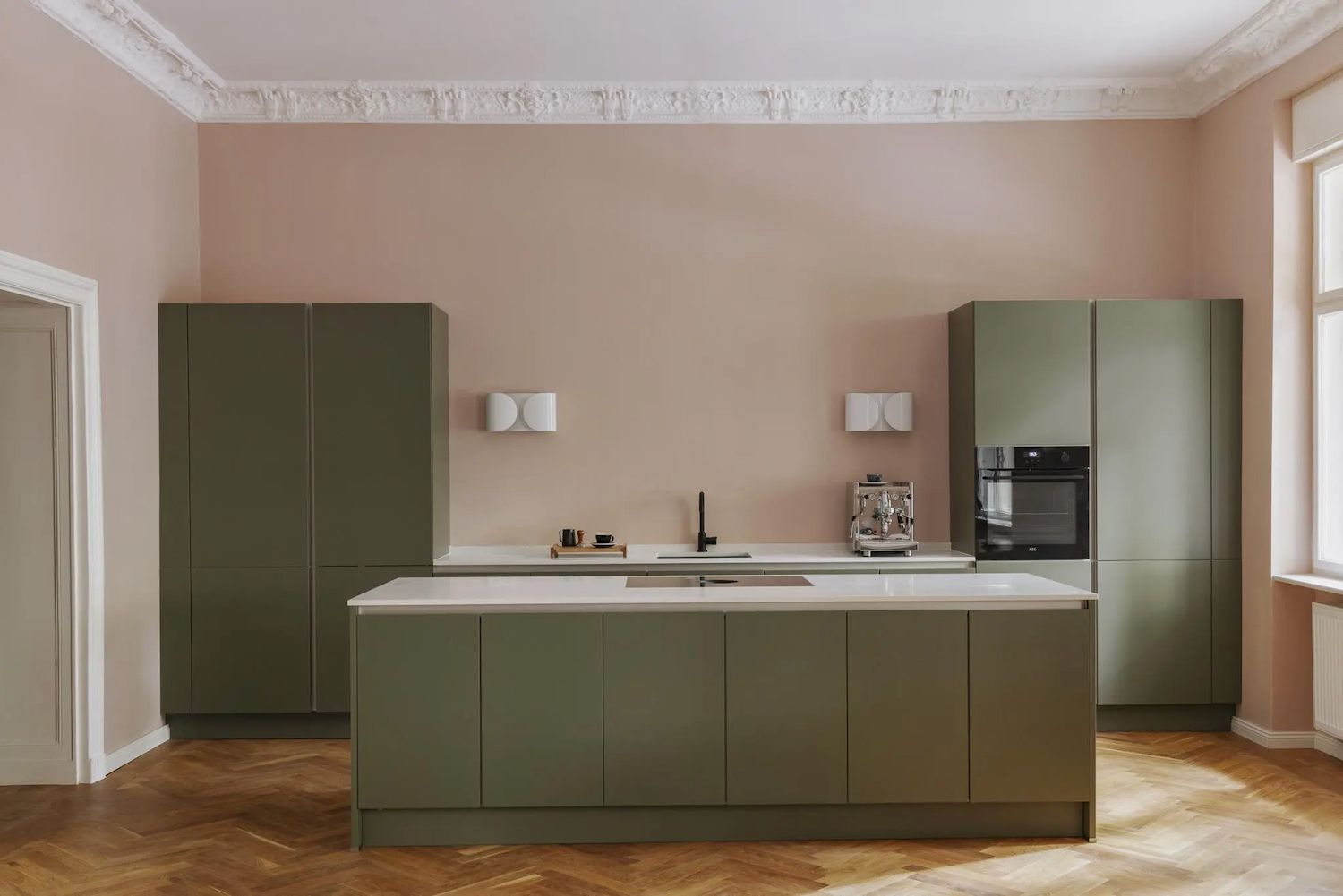 olive green kitchen cabinets with pink walls